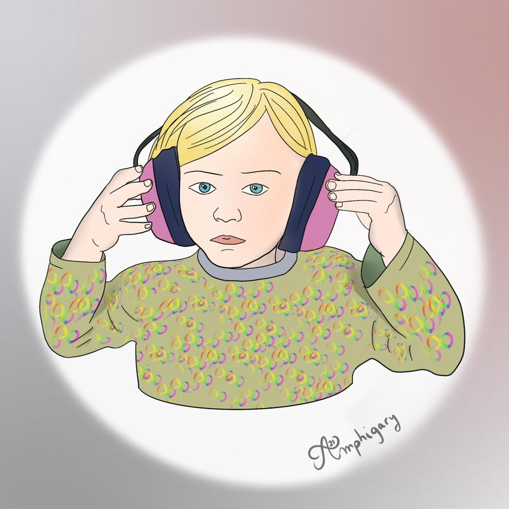 Un enfant avec un casque anti bruit